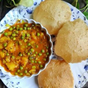 5 Puri with tasty matar alu curry..